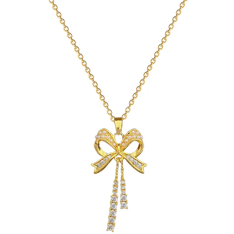 Exquisite and Fashionable Hollow Pearl Bow Tassel Necklace Earrings Set