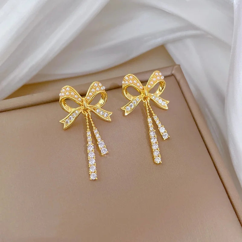 Exquisite and Fashionable Hollow Pearl Bow Tassel Necklace Earrings Set