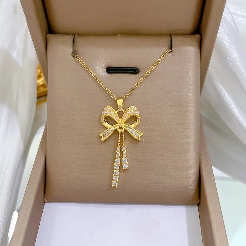 Exquisite and Fashionable Hollow Pearl Bow Tassel Necklace Earrings Set