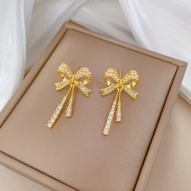 Exquisite and Fashionable Hollow Pearl Bow Tassel Necklace Earrings Set